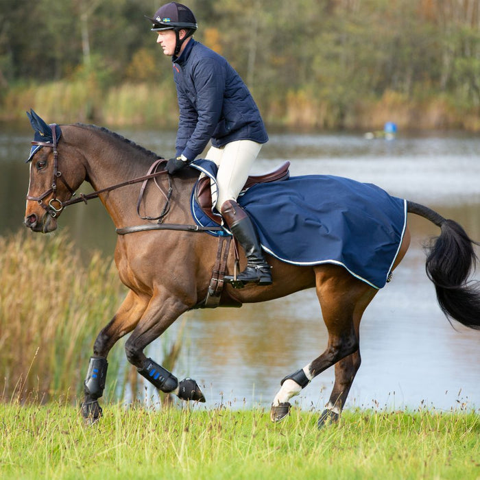 Rambo Waterproof Fleece Exercise Sheet by Horseware Ireland Navy Silver
